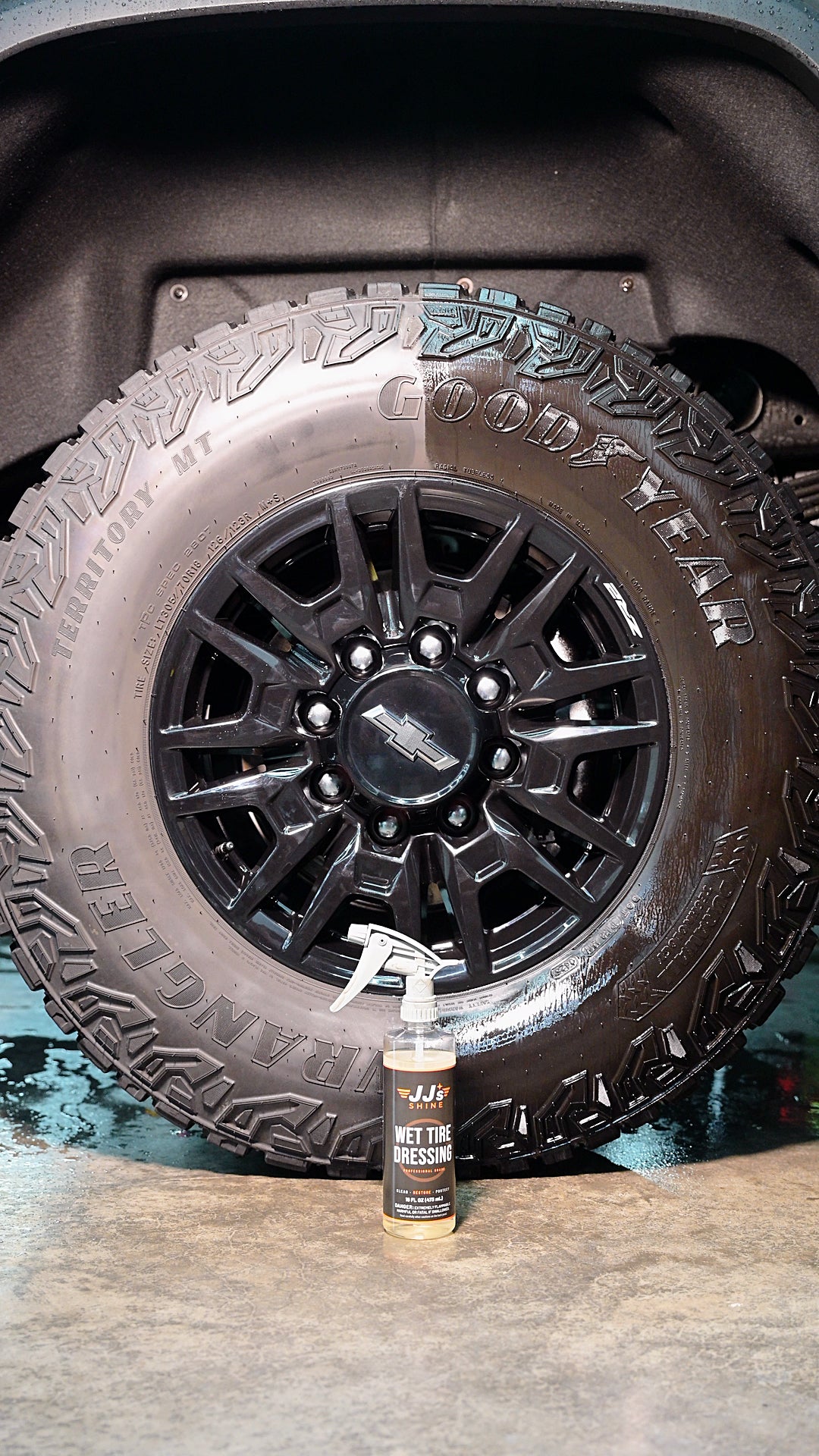 JJ's Wet Tire Dressing: one tire, the dressed half beside the bare half, the bottle in front